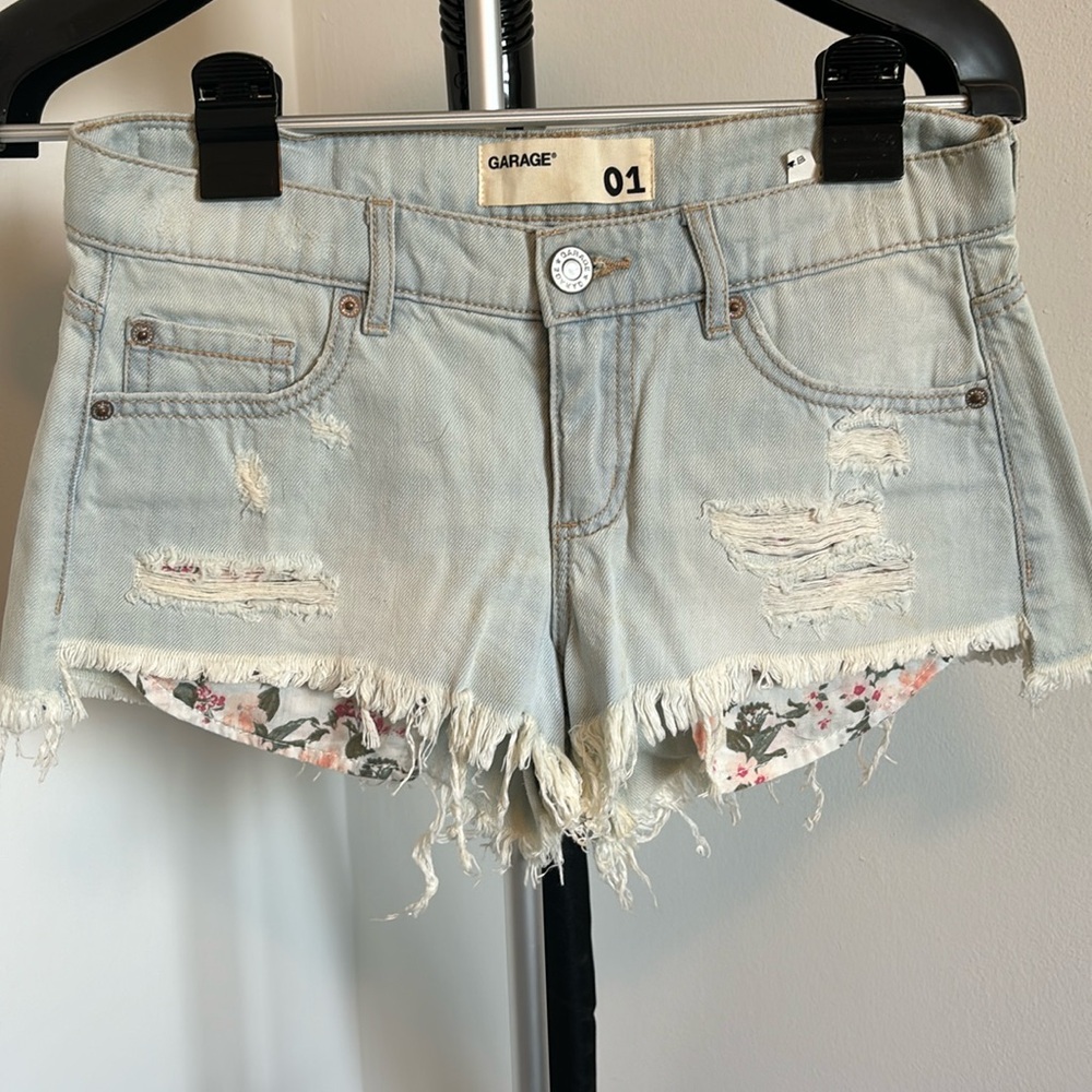 Light blue ripped jean shorts